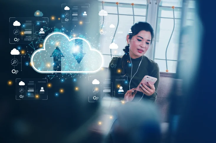 woman working for home via cloud technology on her mobile phone